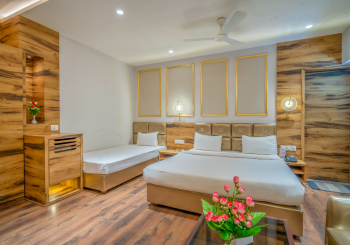 Family hotel room in Guna with double and single bed