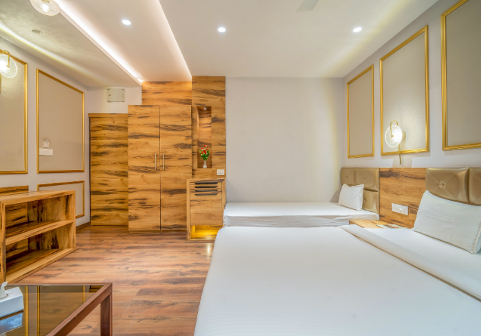 Family room with two beds and wooden panels