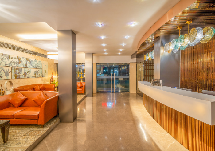 Hotel lobby with orange sofas