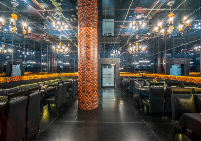 Mosaic family restaurant with mirrored ceiling