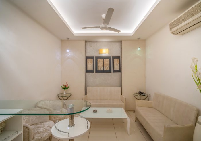 Suite sitting room with glass dining table
