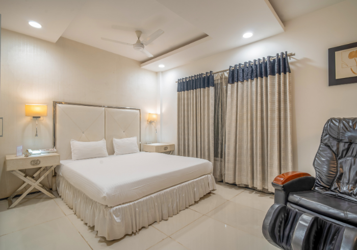 Suite bedroom with massage recliner