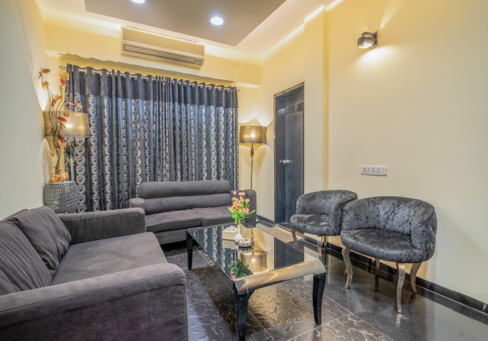 Suite lounge with grey sofas