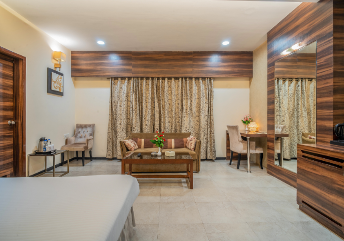 Super Deluxe room lounge with curtains