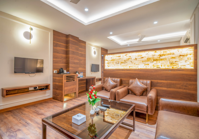 Super Deluxe room lounge, TV and wardrobe