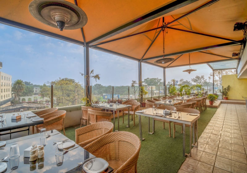 The Terrace Grill dining tables on the rooftop