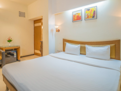 Premium Deluxe Room for a relaxing stay at Hotel Varun